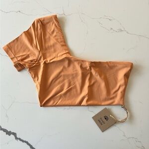 Free People| x Toast Swim| Signature One Shoulder Crop Top. Color sandstone